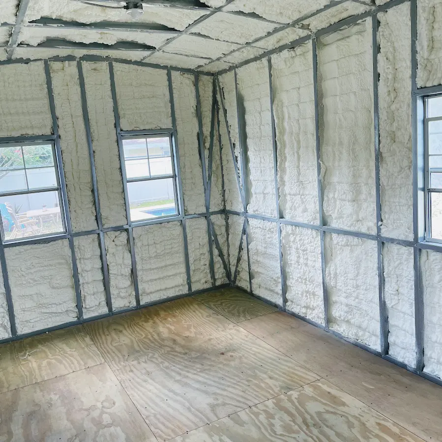 Closed-cell spray foam insulation applied to wall cavities in a residential project in St. Andrews